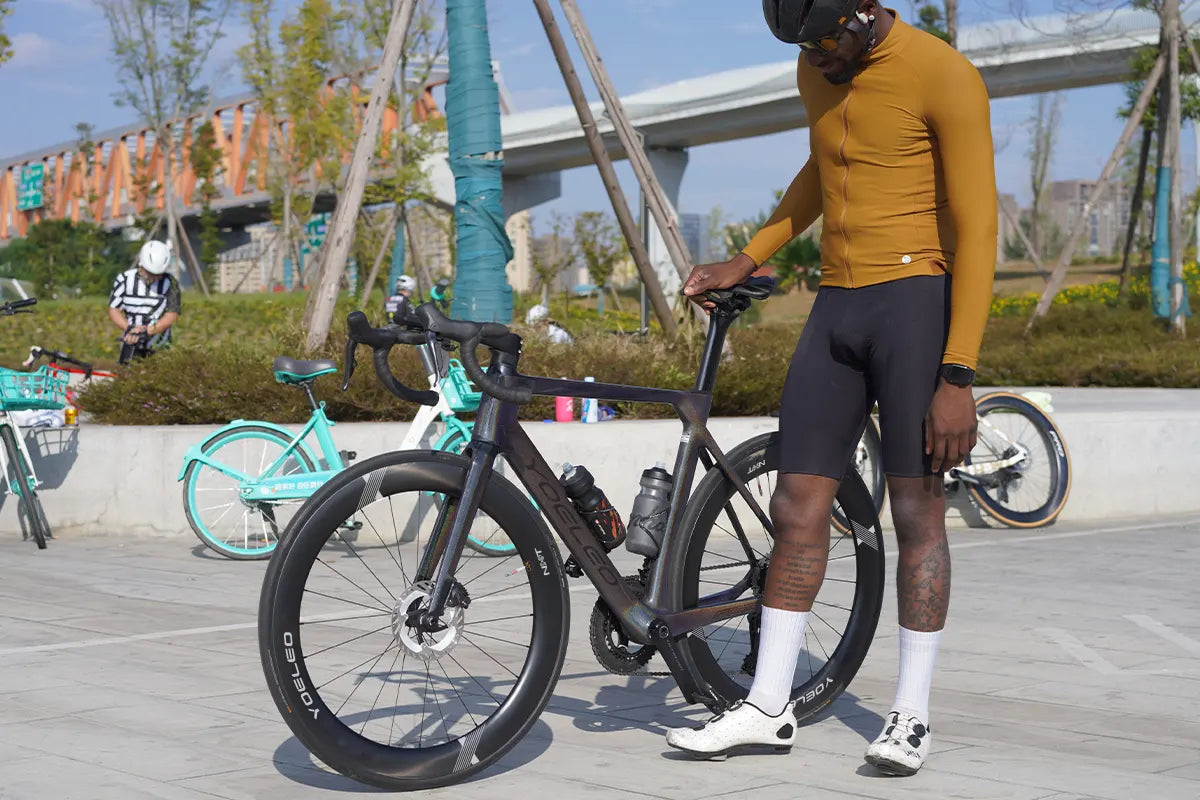 Rider checking his bike